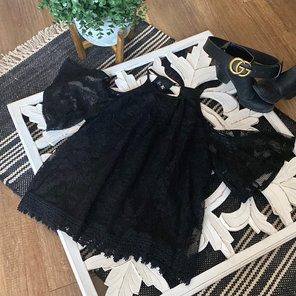 Black lace off shoulder shirt from iZ BYER. Size medium.